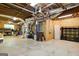 Unfinished basement with visible ductwork and utilities, offering potential for customization and additional storage at 136 Barrington Grange Dr, Sharpsburg, GA 30277