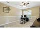 Home office with natural light, neutral walls, providing an ideal workspace for productivity and focus at 136 Barrington Grange Dr, Sharpsburg, GA 30277
