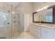 This elegant primary bathroom features double sinks and a walk-in shower with a glass enclosure at 214 Palette Ln, Peachtree City, GA 30269