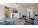 Neutral bonus room with exercise equipment, ceiling fan, and natural light at 214 Palette Ln, Peachtree City, GA 30269
