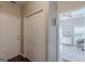 Hallway shows a closet, front door, and view into the living room at 214 Palette Ln, Peachtree City, GA 30269