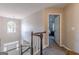 Hallway featuring overhead lighting and a view into the bedroom, creating a welcoming atmosphere at 214 Palette Ln, Peachtree City, GA 30269