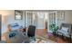 Versatile home office featuring French doors that lead to a hallway and offer great natural light at 214 Palette Ln, Peachtree City, GA 30269