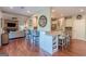 Spacious kitchen with bar seating, granite countertops, and an open layout perfect for gatherings at 214 Palette Ln, Peachtree City, GA 30269