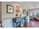 Modern kitchen and bar area with granite counters, stylish seating, and inviting wine storage at 214 Palette Ln, Peachtree City, GA 30269
