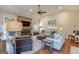 Comfortable living room with natural light, a fireplace, and ample seating for relaxation at 214 Palette Ln, Peachtree City, GA 30269