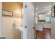 This powder room has a pedestal sink, wainscoting, and a decorative mirror at 214 Palette Ln, Peachtree City, GA 30269