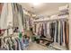 The walk-in closet boasts ample storage with shelving and racks for shoes, clothing, and accessories at 214 Palette Ln, Peachtree City, GA 30269