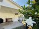 Covered back porch with workspace overlooking the backyard at 610 Tower Rd, Peachtree City, GA 30269