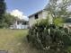Spacious backyard featuring a mix of trees at 610 Tower Rd, Peachtree City, GA 30269
