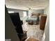This spacious bedroom boasts ample natural light, ceiling fan, and hard wood floors at 610 Tower Rd, Peachtree City, GA 30269
