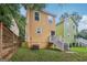 View of the backyard featuring the exterior of the home and a small staircase at 1159 Smith Sw St, Atlanta, GA 30310