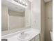 This bathroom features a large mirror, single sink, and a shower/tub combo at 1159 Smith Sw St, Atlanta, GA 30310