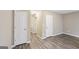 This bedroom features multiple doors and windows, as well as modern flooring at 1159 Smith Sw St, Atlanta, GA 30310