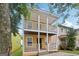 Charming home with double porches offering outdoor living space and neighborhood views at 1159 Smith Sw St, Atlanta, GA 30310