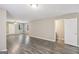 Open-concept living area with modern flooring, neutral paint, and ample natural light, perfect for entertaining at 1159 Smith Sw St, Atlanta, GA 30310