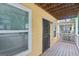 Outdoor porch featuring wood flooring, providing a cozy space to enjoy fresh air and natural light at 1159 Smith Sw St, Atlanta, GA 30310