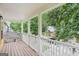 Cozy covered porch providing a relaxing outdoor space with views of the quiet neighborhood at 1159 Smith Sw St, Atlanta, GA 30310