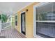 Exterior view of porch with wood floor, offering a cozy outdoor space for relaxation at 1159 Smith Sw St, Atlanta, GA 30310