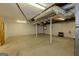 Unfinished basement with open layout, showcasing the utilities and exposed ductwork, awaiting your personal touch at 183 Inman Rd, Fayetteville, GA 30215