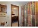 This stylish bathroom with curtain and modern fixtures offers a relaxing space to unwind at 183 Inman Rd, Fayetteville, GA 30215