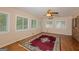 Bonus room featuring multiple windows for natural light and hardwood floors at 183 Inman Rd, Fayetteville, GA 30215