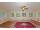 Bonus room featuring hardwood floors, recessed lighting, and bright windows at 183 Inman Rd, Fayetteville, GA 30215