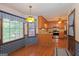 Bright breakfast nook features a chandelier and natural light with blue accents at 183 Inman Rd, Fayetteville, GA 30215
