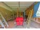 Attached garage interior with tools and equipment, offering ample storage space at 183 Inman Rd, Fayetteville, GA 30215