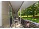 Relaxing covered porch with seating and a view of the yard at 183 Inman Rd, Fayetteville, GA 30215