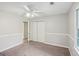 Spacious bedroom featuring carpet, neutral walls, and closet at 5618 Shadow Rock Dr, Lithonia, GA 30058