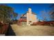 Large backyard with a fence, mature trees, a deck and patio area at 190 Country Club Dr, Hiram, GA 30141