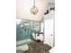 Elegant bathroom featuring a modern bathtub, a separate glass shower, and chic fixtures at 190 Country Club Dr, Hiram, GA 30141