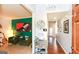 Stylish entryway featuring a vibrant green accent wall, a cozy seating area, and seamless flow into the home at 190 Country Club Dr, Hiram, GA 30141