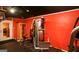 Brightly-colored home gym with exercise equipment and a sauna for relaxation at 190 Country Club Dr, Hiram, GA 30141