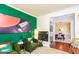Inviting living room featuring colorful decor and a view into the dining area at 190 Country Club Dr, Hiram, GA 30141