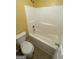 Bathroom features a white toilet, and a white tub/shower combo at 1472 Queenie Smith Ne Rd, Conyers, GA 30012