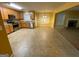 Modern kitchen offers stainless steel appliances, ample counter space, and easy access to an adjacent fireplace at 1472 Queenie Smith Ne Rd, Conyers, GA 30012