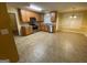 This spacious kitchen features updated appliances, tiled floors, and ample counter space for meal preparation at 1472 Queenie Smith Ne Rd, Conyers, GA 30012