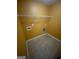 Laundry room with tile floors, yellow walls, and hookups for washer and dryer at 1472 Queenie Smith Ne Rd, Conyers, GA 30012