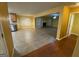Open-concept area featuring tile floors, a fireplace, and seamless flow between the kitchen and living areas at 1472 Queenie Smith Ne Rd, Conyers, GA 30012