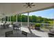Spacious outdoor patio featuring tables, chairs, and serene views of the surrounding greenery at 1472 Queenie Smith Ne Rd, Conyers, GA 30012