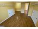 Spacious walk-in closet featuring rod and wire shelving and wood look floors at 1472 Queenie Smith Ne Rd, Conyers, GA 30012