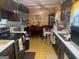 Functional kitchen with vintage countertops and a dining area at 420 Dot Dr, South Fulton, GA 30349