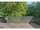 Wooden deck overlooking the treed backyard at 419 Jeffery Dr, Locust Grove, GA 30248