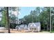 New homes in a quiet, wooded community showcasing a suburban lifestyle at 485 West Ave, Bowdon, GA 30108