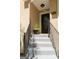 Charming front entrance with stairs and iron railings at 1252 Heritage Dr, Villa Rica, GA 30180