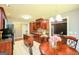 Kitchen featuring stainless steel appliances, tile backsplash, granite countertops, and an island at 1252 Heritage Dr, Villa Rica, GA 30180