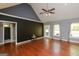 Bright living room featuring hardwood floors, recessed lighting, and access to the outdoors at 1252 Heritage Dr, Villa Rica, GA 30180