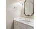 Bathroom with decorative sink, faucet, and mirror. Features a white vanity and neutral walls at 914 Champions Way, Mcdonough, GA 30252